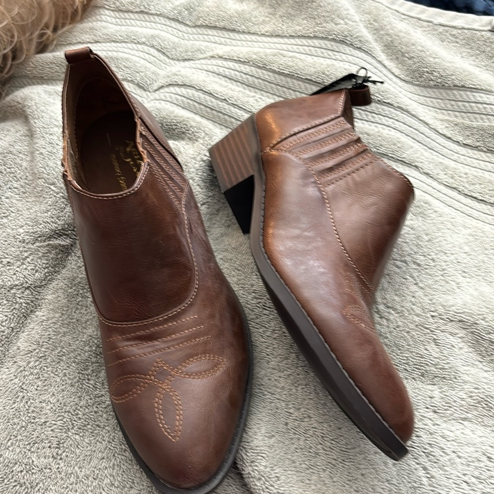 Brand new about 3 years & never worn. Bought at Penny’s & memory foam insole